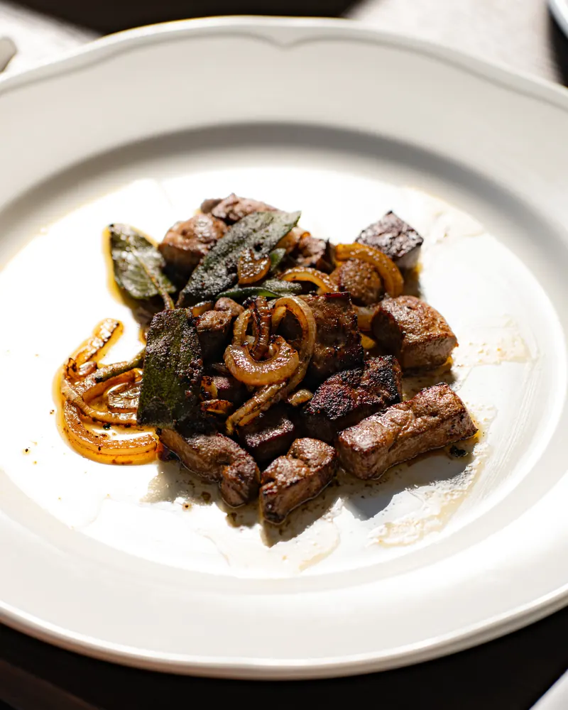 Calf’s liver Veneziana with onions and herbs