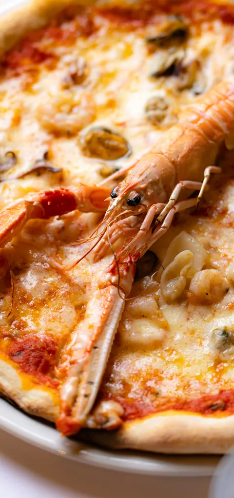 Pizza Frutti di Mare with a langoustine